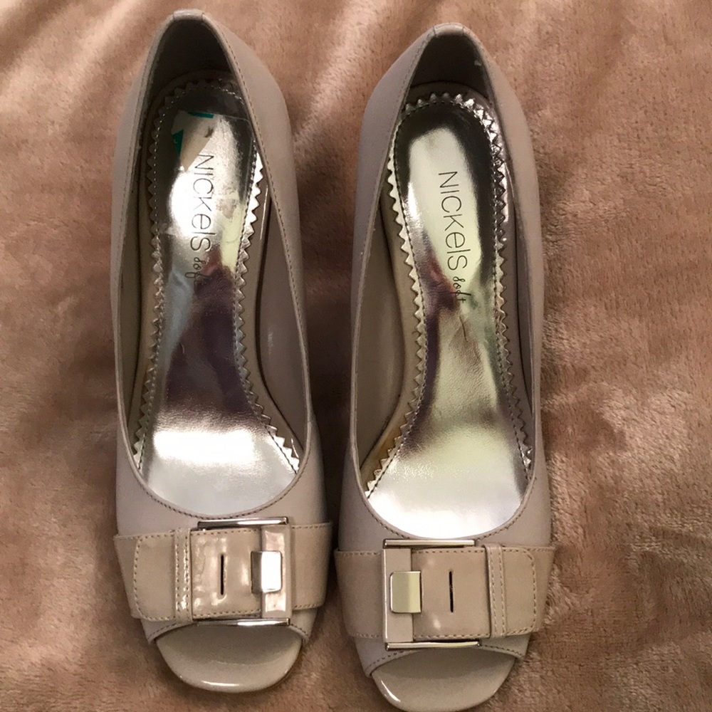 Nickels soft gray buckle heels.